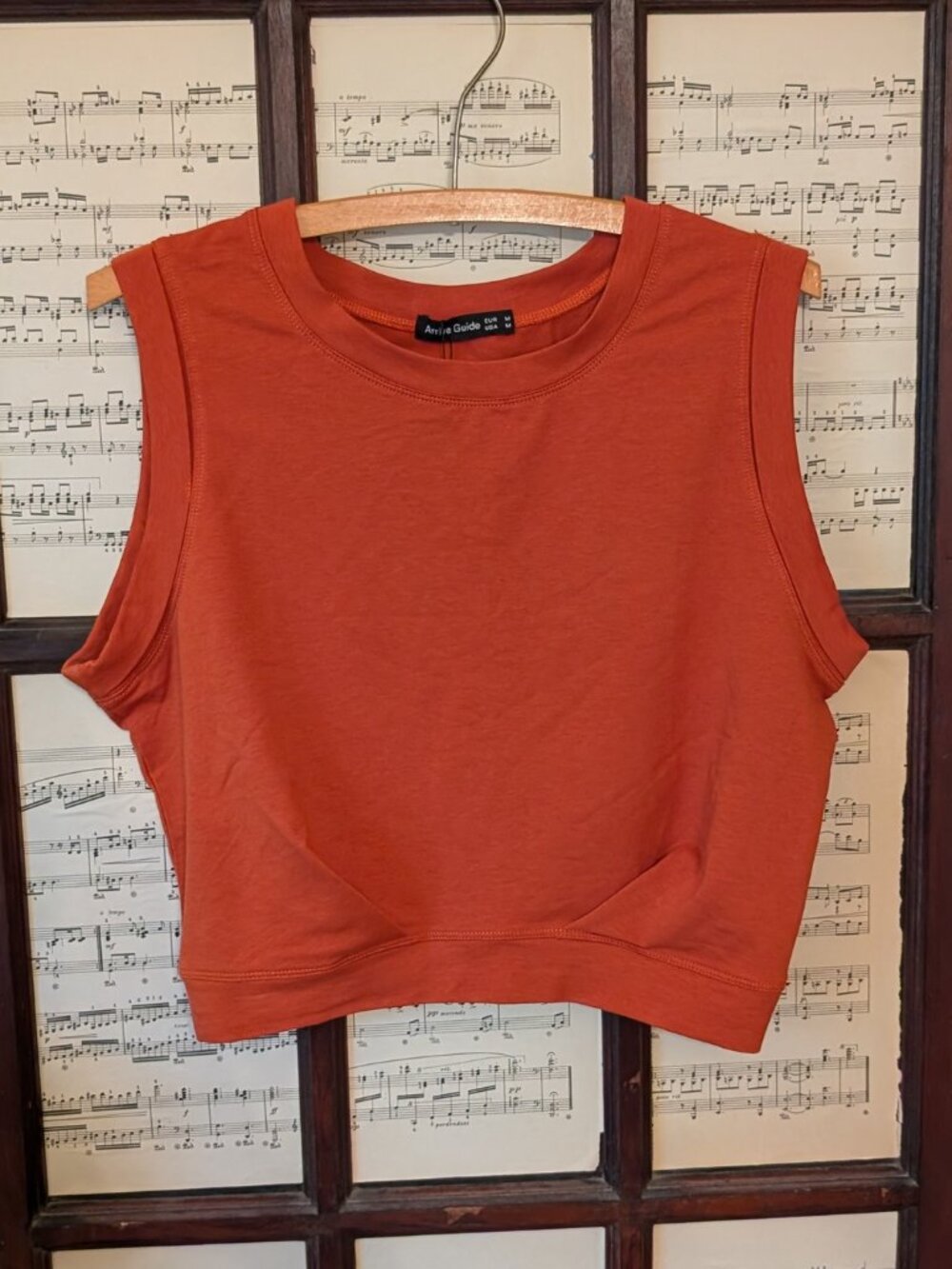 Orange crop athletic top, size medium. brand is Arrive Guide